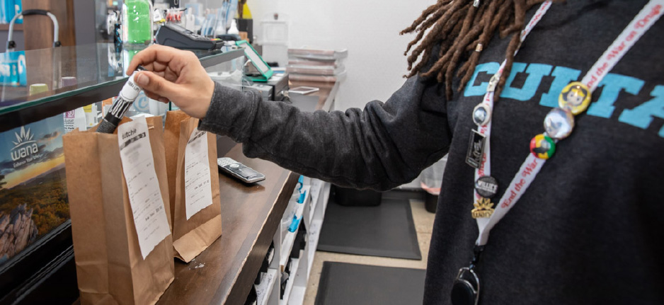budtender working at a dispensary